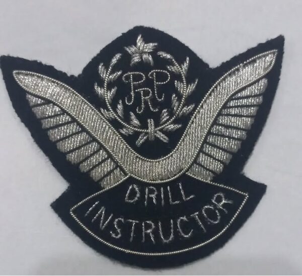 Drill Instructor embroidered badge patch with silver wings and PRP initials on a black fabric background